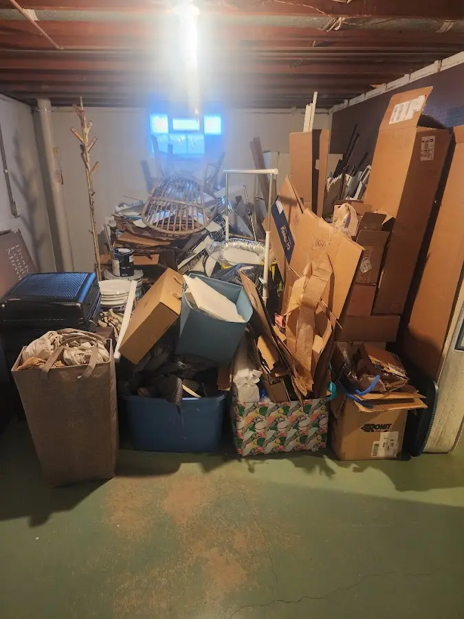 Roll-off dumpster container at job site for 15 Yard Dumpster Rental in Tuscola